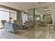 Inviting lobby area featuring tile floors, comfortable seating, and large windows for natural light at 3003 S Atlantic Ave # 21A2, Daytona Beach Shores, FL 32118