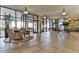 Spacious lobby boasts comfortable seating and is enhanced by stylish decor and bright lighting at 3003 S Atlantic Ave # 21A2, Daytona Beach Shores, FL 32118