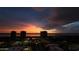 Spectacular night view showcasing city skyline and vibrant sunset colors at 3003 S Atlantic Ave # 21A2, Daytona Beach Shores, FL 32118