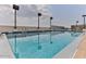 Rooftop pool with clear water and overhead lighting at 3003 S Atlantic Ave # 21A2, Daytona Beach Shores, FL 32118