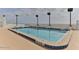 Rooftop pool with clear water and overhead lighting at 3003 S Atlantic Ave # 21A2, Daytona Beach Shores, FL 32118