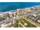 Aerial view of oceanfront condos near a scenic coastal highway, convenient beach access at 3145 S Atlantic Ave # 503, Daytona Beach Shores, FL 32118