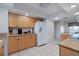 Spacious kitchen with stainless steel appliances, granite countertops, and ample cabinet space at 3145 S Atlantic Ave # 503, Daytona Beach Shores, FL 32118