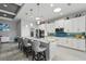 Modern kitchen with a large center island, offering seating and ample counter space at 3229 Medici Blvd, New Smyrna Beach, FL 32168