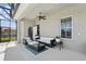 Covered outdoor seating area offering a relaxing retreat with views of the backyard at 3229 Medici Blvd, New Smyrna Beach, FL 32168