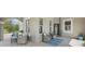 Inviting porch with comfortable seating and charming decor at 3229 Medici Blvd, New Smyrna Beach, FL 32168