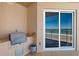 Ocean view from balcony highlights built-in outdoor kitchen and sliding glass doors at 3245 S Atlantic Ave # 304, Daytona Beach Shores, FL 32118