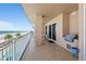 Spacious balcony features outdoor kitchen, ocean views, and lounge seating at 3245 S Atlantic Ave # 304, Daytona Beach Shores, FL 32118