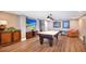Fun-filled game room with pool table, TV and comfortable seating at 3245 S Atlantic Ave # 304, Daytona Beach Shores, FL 32118