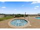 Outdoor hot tub on a brick patio with beach views, perfect for relaxation at 3245 S Atlantic Ave # 304, Daytona Beach Shores, FL 32118