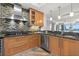 This well-appointed kitchen includes stainless steel appliances, custom cabinets, and an ocean view at 3245 S Atlantic Ave # 304, Daytona Beach Shores, FL 32118