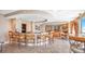 Spacious lounge area with comfortable seating, kitchen and fireplace for residents at 3245 S Atlantic Ave # 304, Daytona Beach Shores, FL 32118