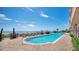 Exterior view of a long pool leading out to a beachfront with lounge chairs at 3245 S Atlantic Ave # 304, Daytona Beach Shores, FL 32118