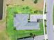This bird's eye view highlights professional landscaping and mature foliage creating a private, serene atmosphere for comfortable living at 3322 Modena Way, New Smyrna Beach, FL 32168