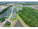 A Primary-planned community boasting luxurious homes, scenic ponds, and lush greenery, creating an inviting atmosphere for all residents at 3322 Modena Way, New Smyrna Beach, FL 32168