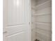 Bright closet featuring white wire shelving and white trim at 3322 Modena Way, New Smyrna Beach, FL 32168