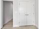Bright hallway with white trim and closet with double doors at 3322 Modena Way, New Smyrna Beach, FL 32168