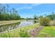 Scenic view of the pond behind the property at 3322 Modena Way, New Smyrna Beach, FL 32168