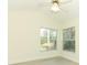 Bright bedroom with two windows and new floors at 340 Hampton Hills Ct, Debary, FL 32713