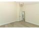 Bright bedroom with a modern chandelier and light, wood-look flooring at 340 Hampton Hills Ct, Debary, FL 32713
