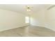 Bright bedroom with fresh white walls, light floors, and a ceiling fan at 340 Hampton Hills Ct, Debary, FL 32713