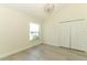 Spacious bedroom with a window and closet at 340 Hampton Hills Ct, Debary, FL 32713