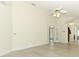 Bright living room featuring high ceilings and a ceiling fan at 340 Hampton Hills Ct, Debary, FL 32713