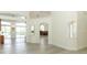 Open living space with fireplace, light wood floors, and easy access to outdoor living at 340 Hampton Hills Ct, Debary, FL 32713