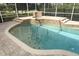 In-ground pool and spa surrounded by pavers at 340 Hampton Hills Ct, Debary, FL 32713