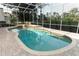Screened-in pool with a tanning deck and lush landscaping at 340 Hampton Hills Ct, Debary, FL 32713
