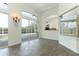 Bright kitchen area featuring large windows with views of the pool and backyard at 340 Hampton Hills Ct, Debary, FL 32713