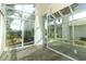 Bright sunroom with floor-to-ceiling windows and access to the backyard at 340 Hampton Hills Ct, Debary, FL 32713