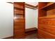 Spacious walk-in closet with custom wood shelving and drawers at 340 Hampton Hills Ct, Debary, FL 32713