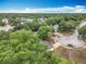 Aerial view of home with mature trees located in a cul-de-sac at 400 Landress Ln, Deland, FL 32724