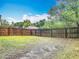 The spacious fenced backyard offers plenty of privacy at 400 Landress Ln, Deland, FL 32724