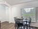Cozy dining area features wood floors and a window with natural light at 400 Landress Ln, Deland, FL 32724