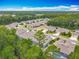 A high angle view of a peaceful residential neighborhood with tree lined streets at 409 Nowell Loop, Deland, FL 32724