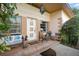 Inviting front porch with seating and decorative details at 409 S Sparkman Ave, Orange City, FL 32763