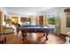 Large game room featuring a pool table and entertainment area at 409 S Sparkman Ave, Orange City, FL 32763