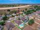Showing a neighborhood with numerous single-Gathering homes on tree-lined streets in a suburban setting at 4604 Barbados Loop, Clermont, FL 34711