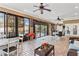 Bright and airy indoor living space with views of the pool and backyard at 4604 Barbados Loop, Clermont, FL 34711