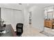 Functional home office with built-in storage and access to a bathroom at 4604 Barbados Loop, Clermont, FL 34711