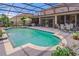 Gorgeous screened-in pool with ample seating, ideal for outdoor entertainment and leisure at 4604 Barbados Loop, Clermont, FL 34711