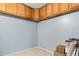 Abundant storage with wooden cabinets providing lots of space at 4604 Barbados Loop, Clermont, FL 34711