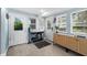 Convenient mud room with natural lighting, stylish cabinet storage, and exterior access at 51 Silk Moss Ct, South Daytona, FL 32119