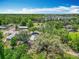 The aerial view showcases a property with lush greenery and neighborhood surroundings at 511 Doctors Dr, Oviedo, FL 32765