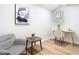 Bright office space featuring hardwood floors, desk and chair, natural light, and stylish decor at 511 Doctors Dr, Oviedo, FL 32765