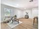 Bright living room featuring neutral colors, lots of natural light, and modern furnishings at 511 Doctors Dr, Oviedo, FL 32765