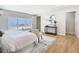 Bright main bedroom with large windows, neutral decor, and stylish furnishings at 511 Doctors Dr, Oviedo, FL 32765