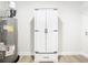 Utility room featuring cabinet and water heater at 511 Doctors Dr, Oviedo, FL 32765